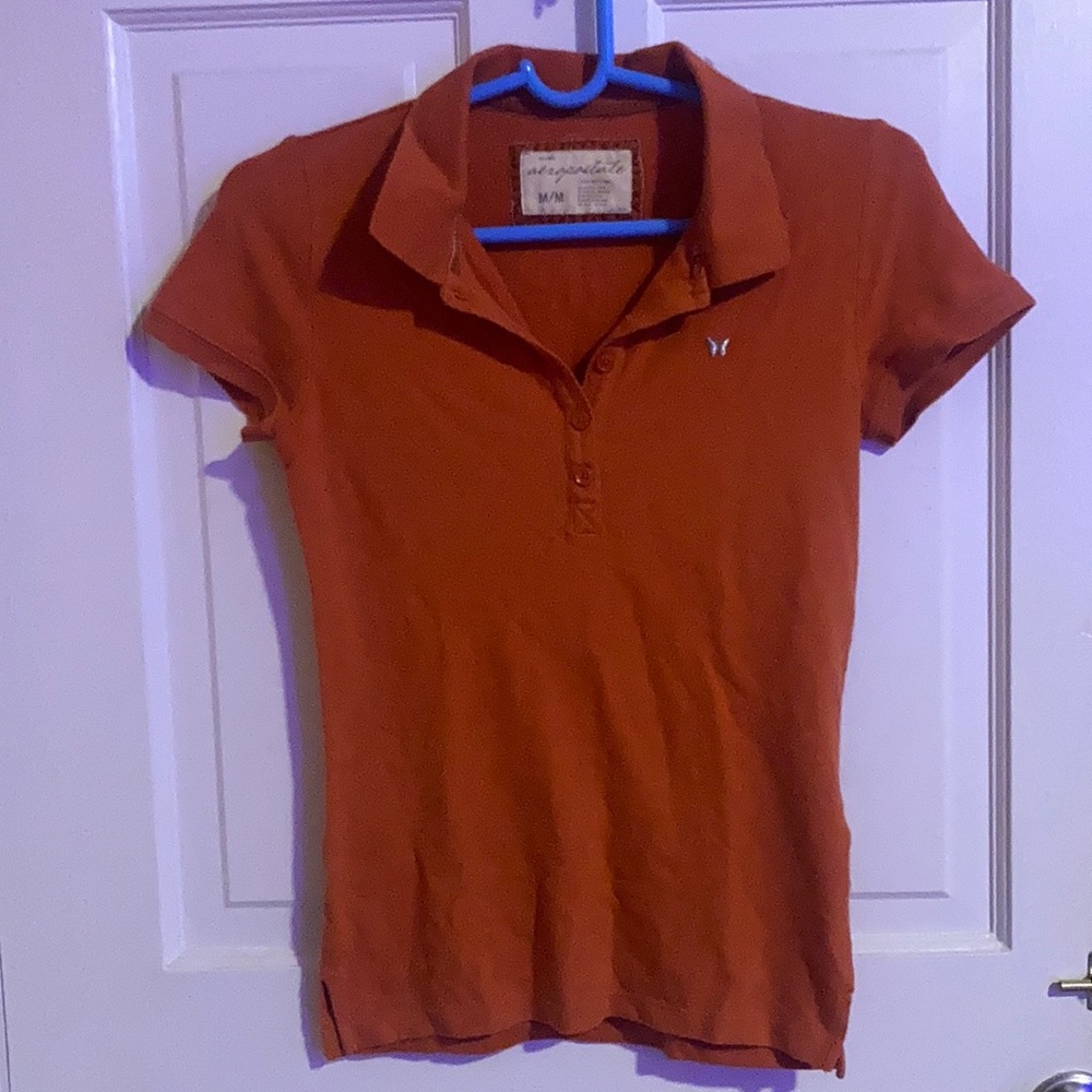 Refreshing Orange Polo w butterfly detail🍊🦋